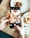 A happy customer enjoying beautifully styled food photography.