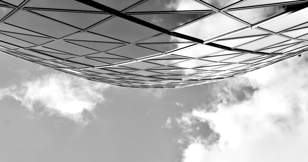 a black and white photo of a metal structure