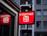 Internet LED signage beside building near buildings