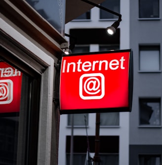 Internet LED signage beside building near buildings