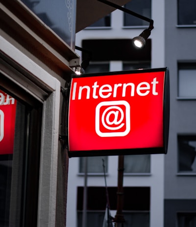 Internet LED signage beside building near buildings