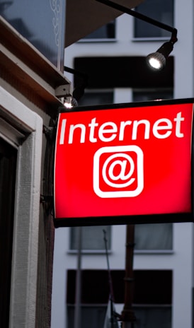 Internet LED signage beside building near buildings