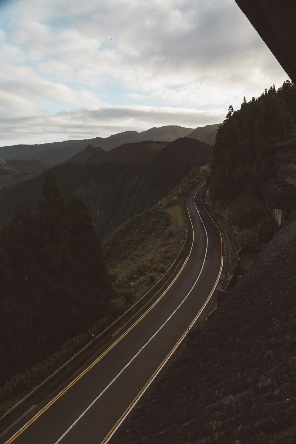 empty road beside cliff