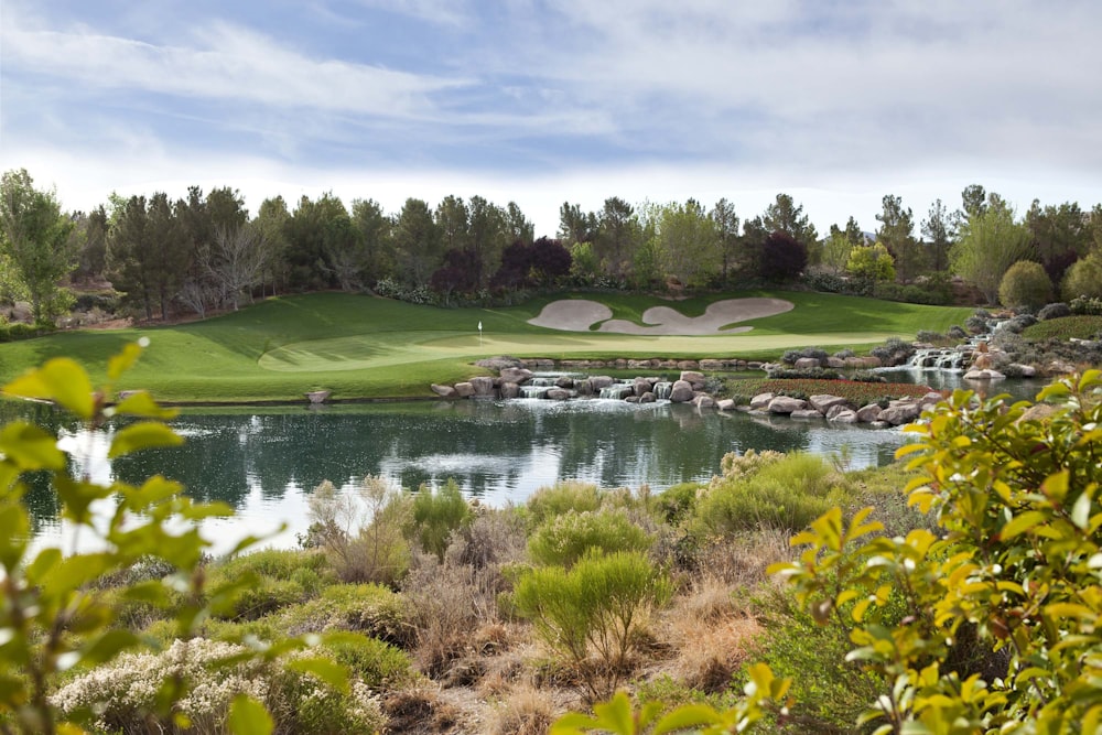 golf course view with lagoon