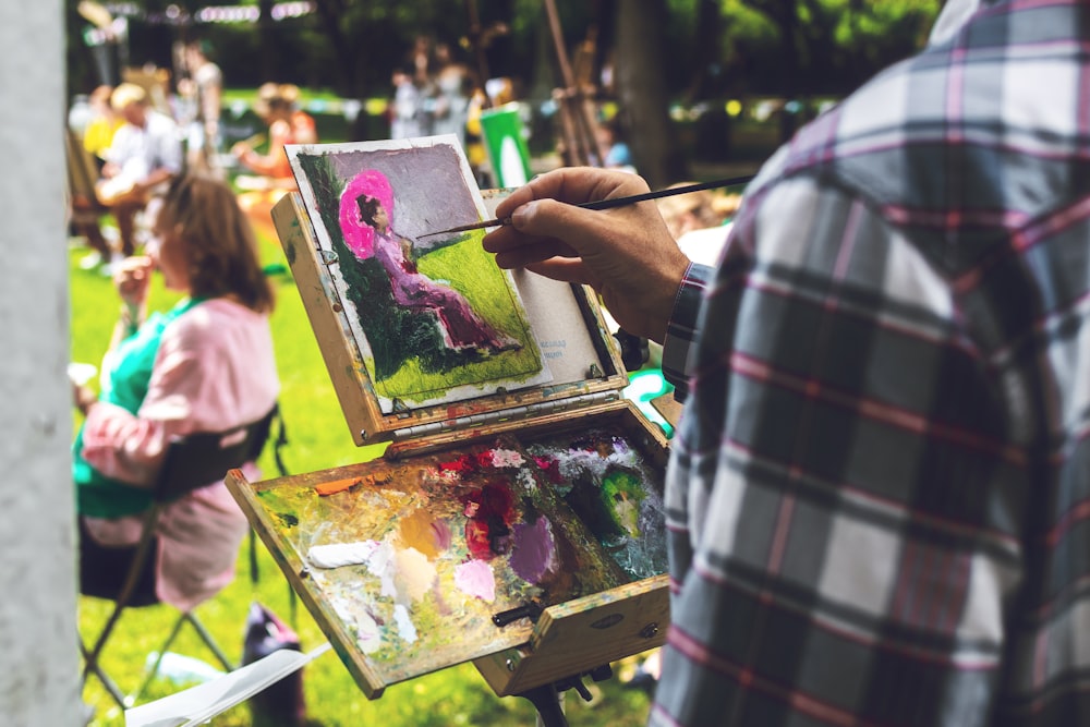 woman holding umbrella painting