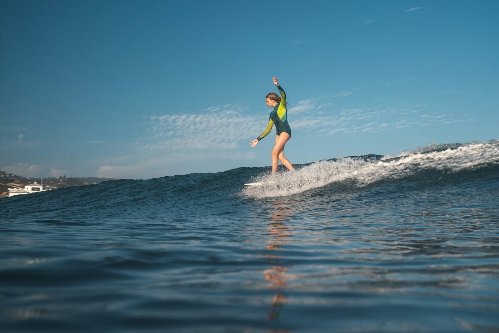 Sony a7R III + Sony Vario-Tessar T* FE 16-35mm F4 ZA OSS sample photo. Woman surfing photography