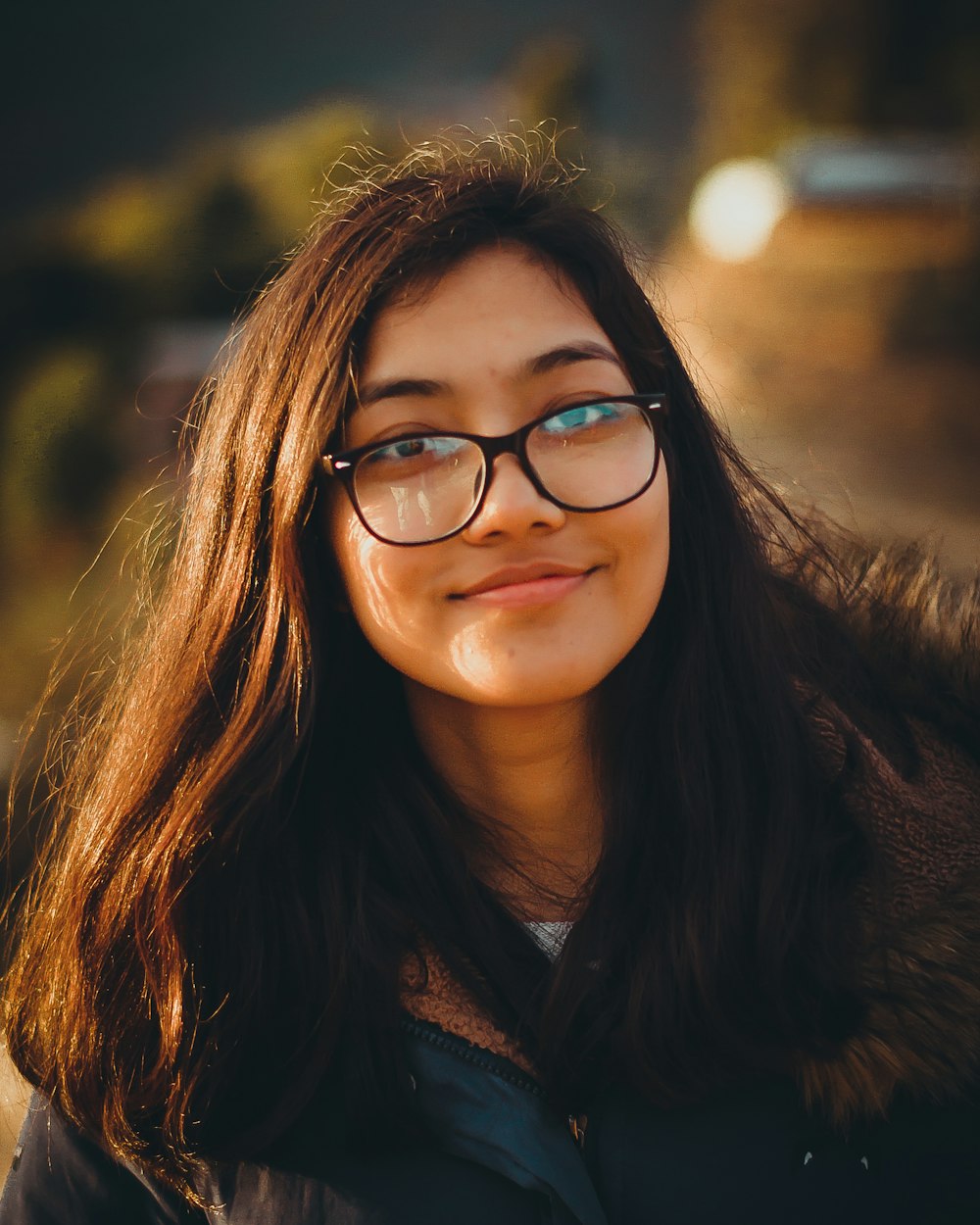 woman in black-framed eyeglasses