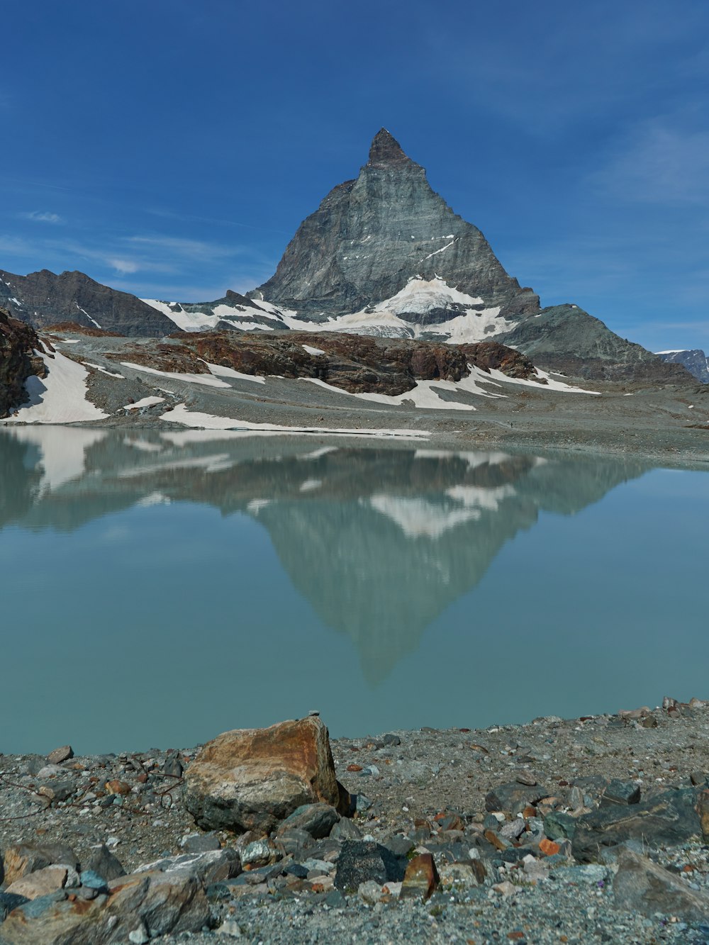 landscape photography of mountain near body of water