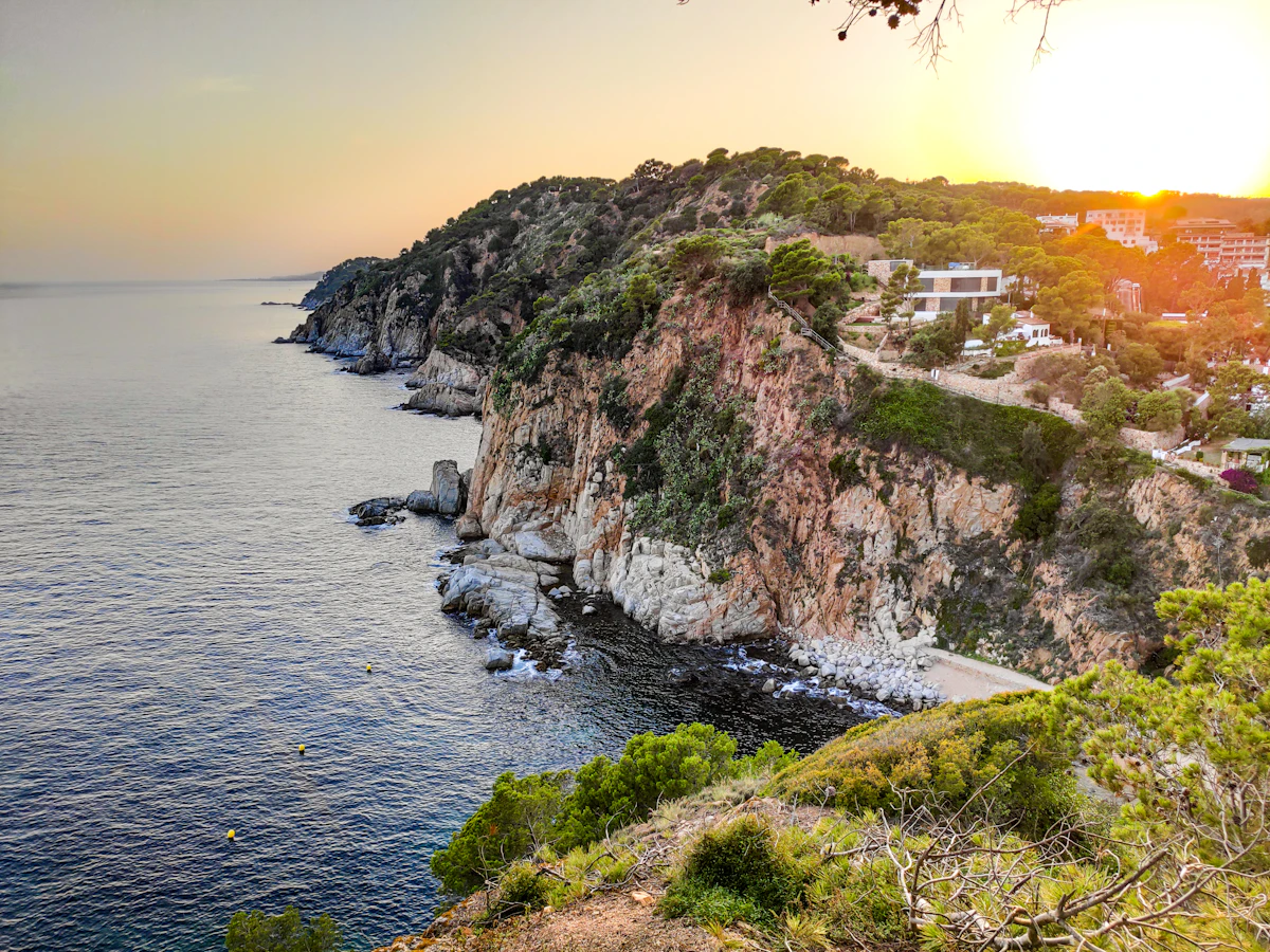 Aerial view of a Costa Brava cliff and cove