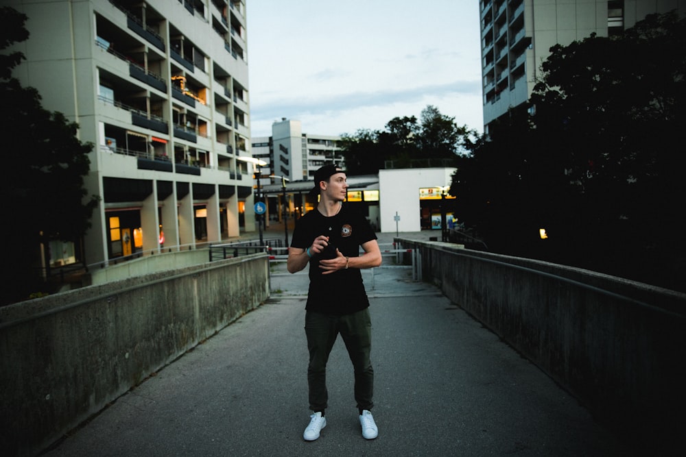 man standing on concrete ground