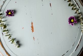 Finished wood-burned floral design sealed with a smooth finish.