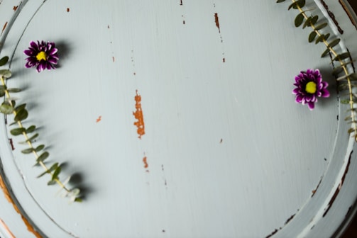 Finished wood-burned floral design sealed with a smooth finish.