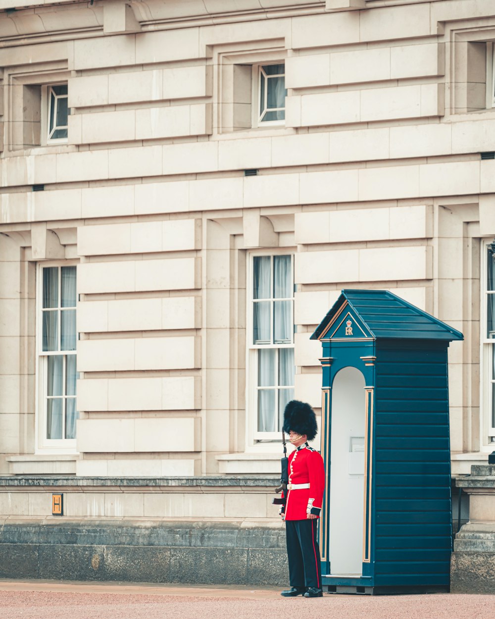 soldier standing near building