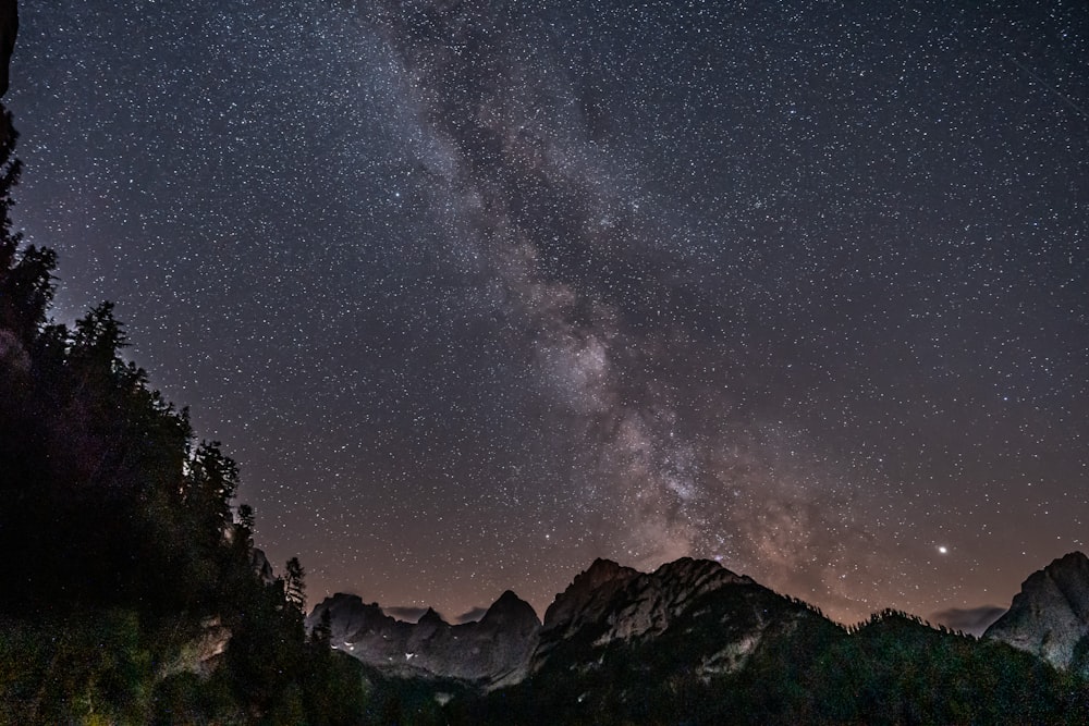 mountain under starry sky