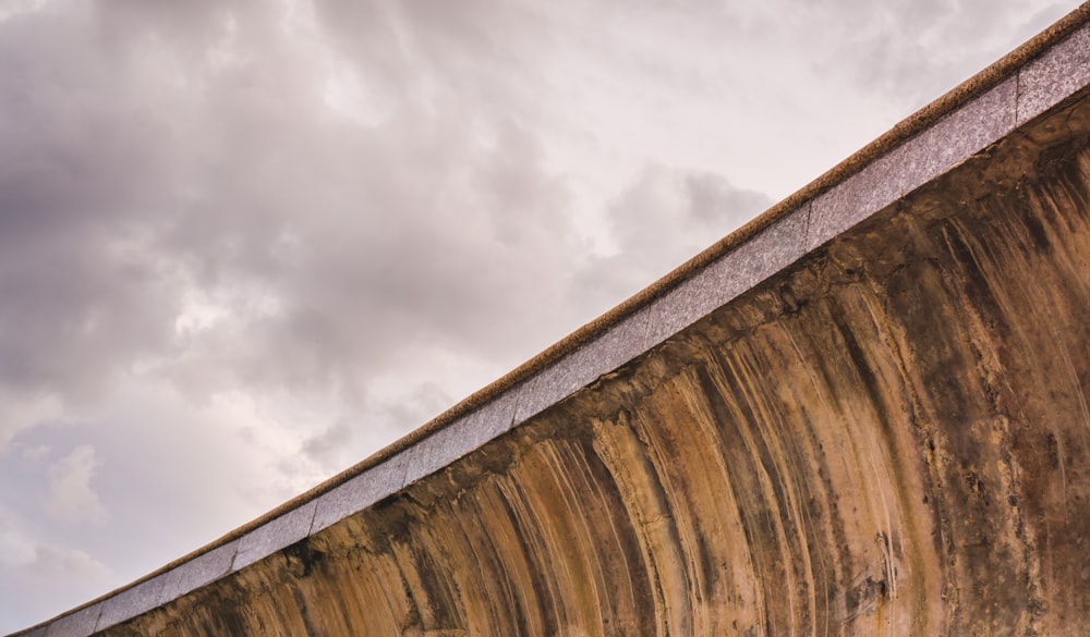 a man riding a skateboard up the side of a ramp