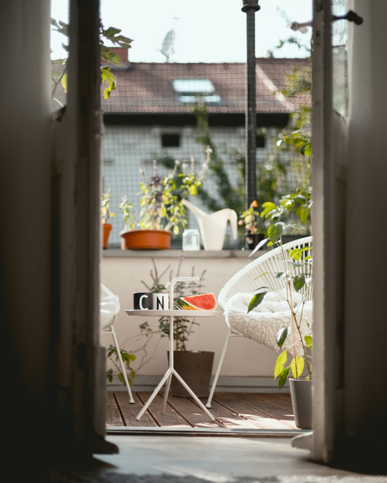 photo by Niklas Hamann via unsplash.com - white outdoor furniture and decor