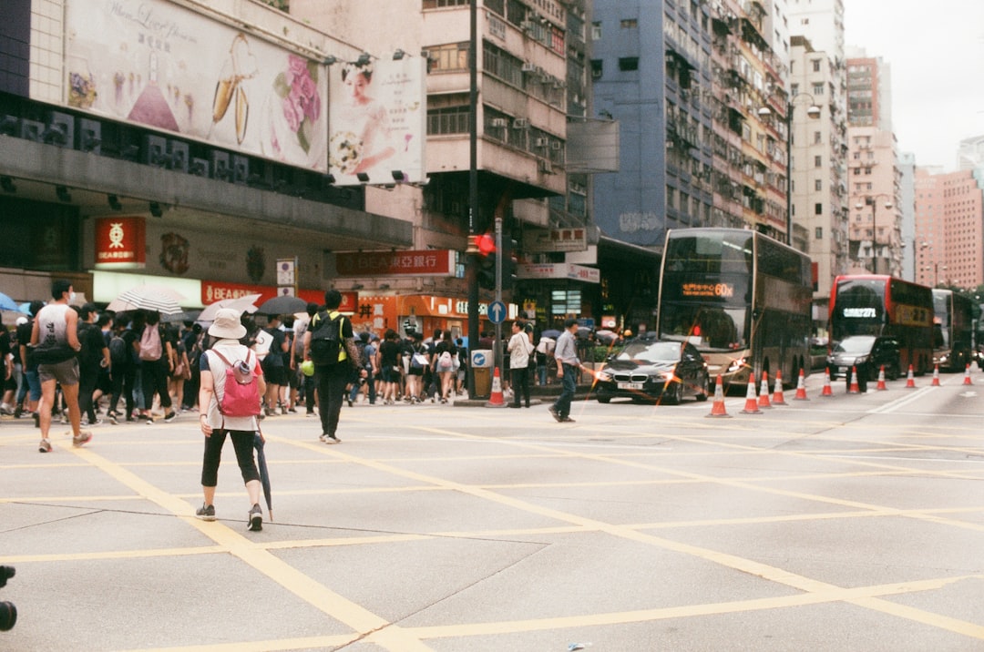 people walking around city streets