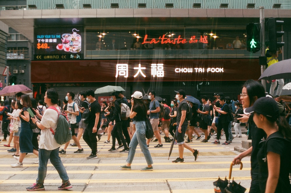 people walking on pedestrian lane
