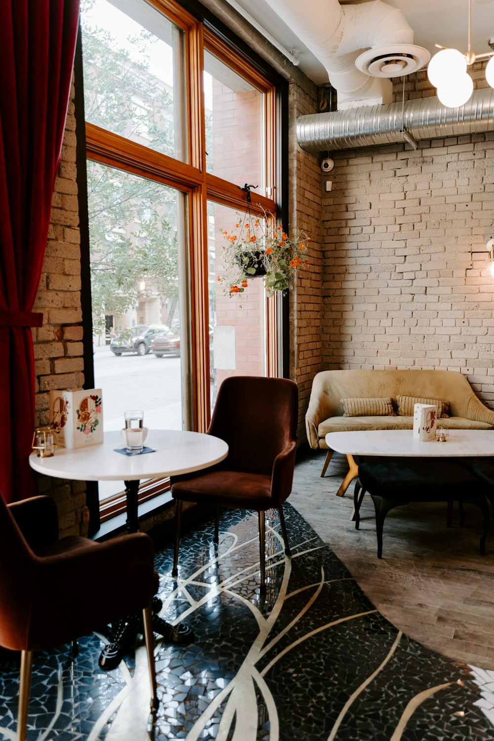 empty chairs beside window