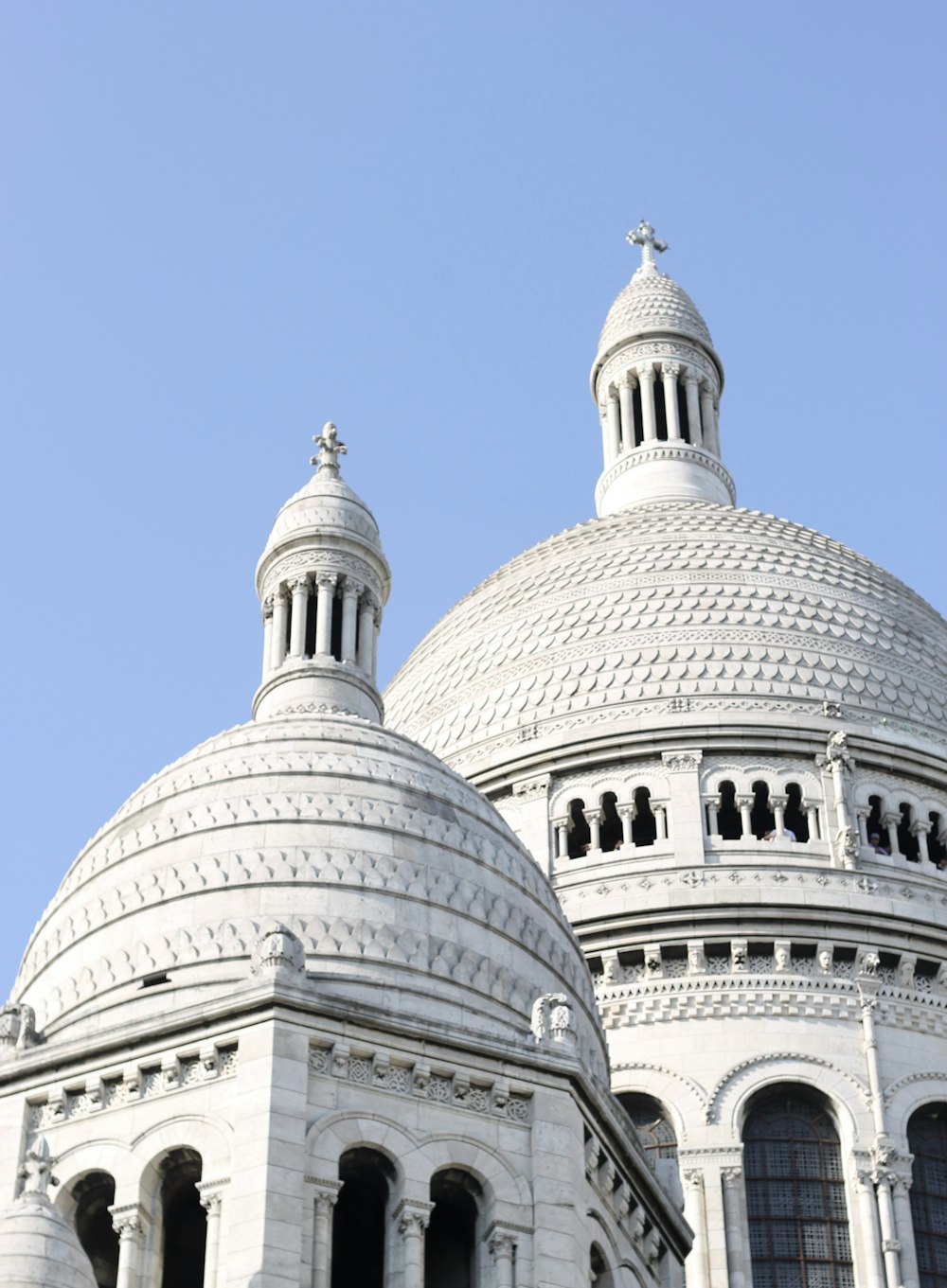 low-angle photography of white dome cathedral