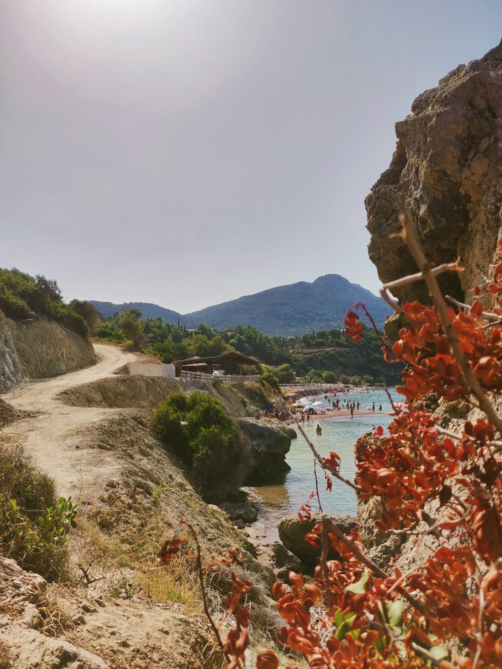 body of water beside pathway during datime