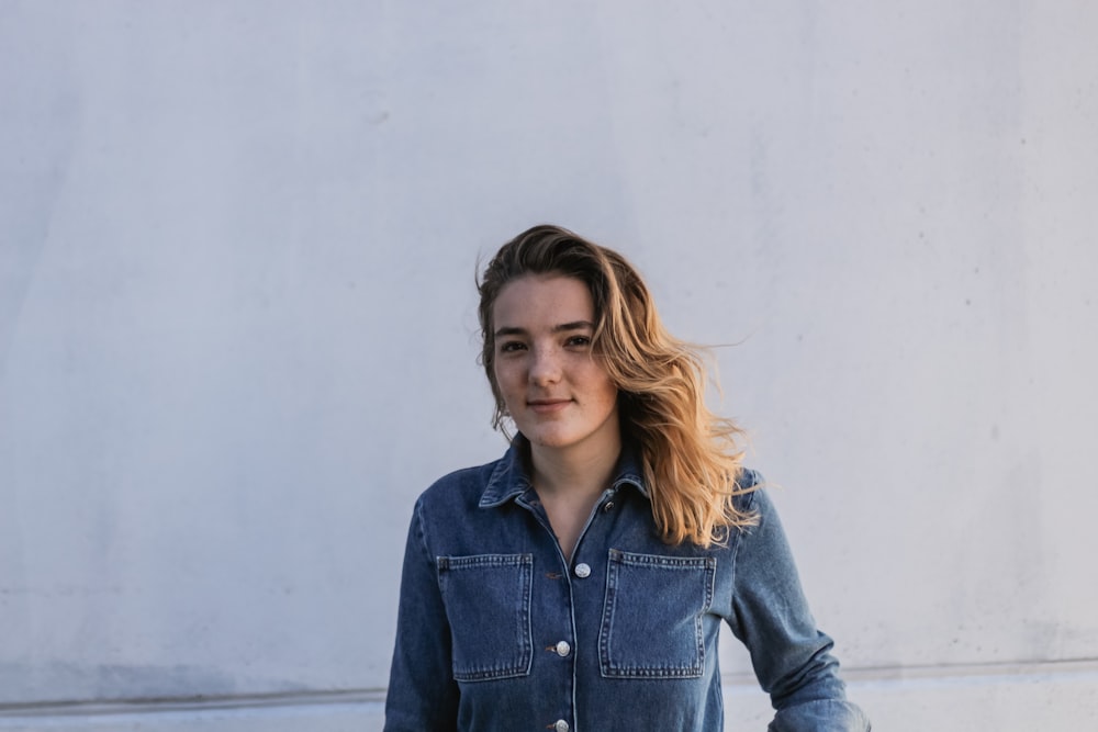 woman wearing blue denim jacket