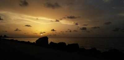 silhouette photography of ocean guyana google meet background