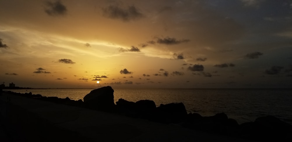 silhouette photography of ocean