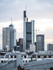 grey high-rise buildings under grey cloudy sky