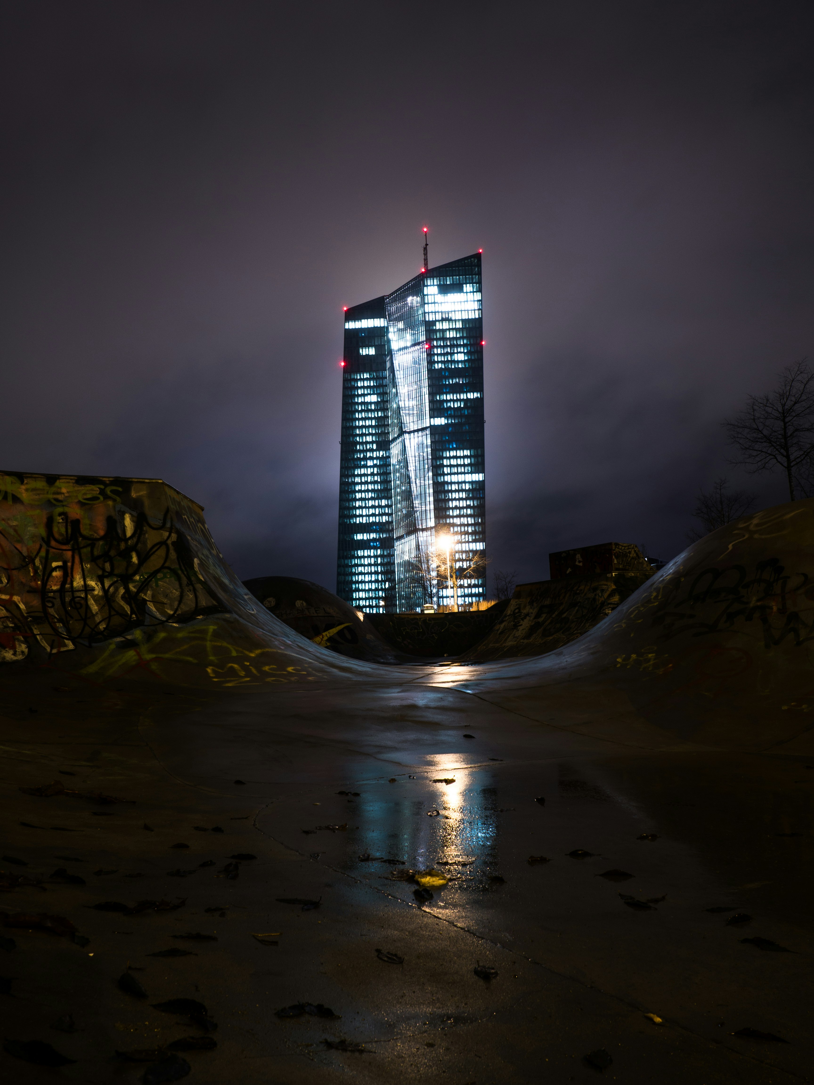 European Central Bank (ECB) headquarters in Frankfurt at night. 