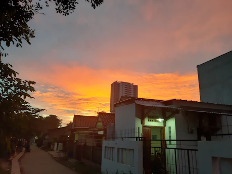 A serene residential neighborhood at dusk, highlighting well-maintained rental homes.