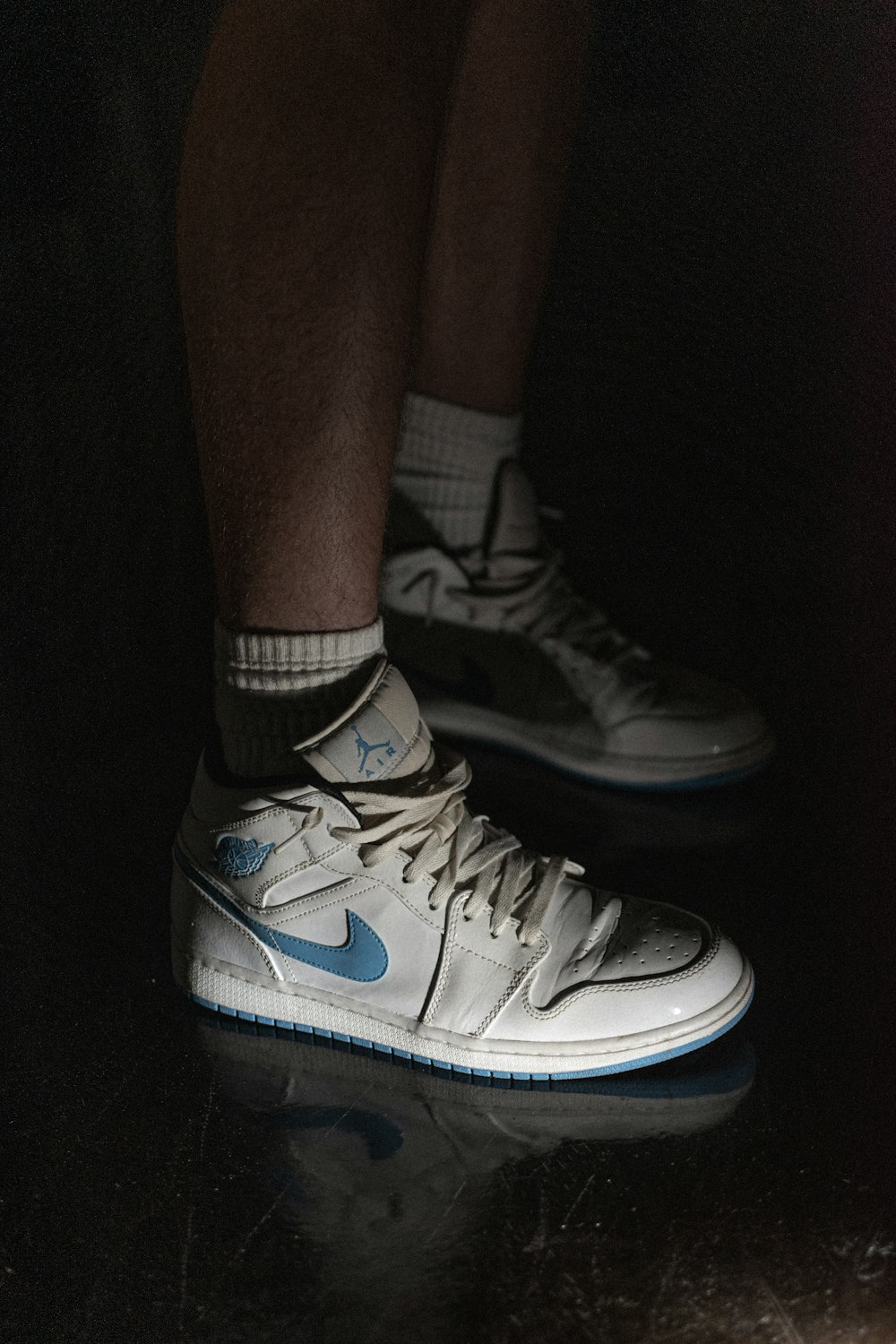 blue-and-white Air Jordan 1 shoes