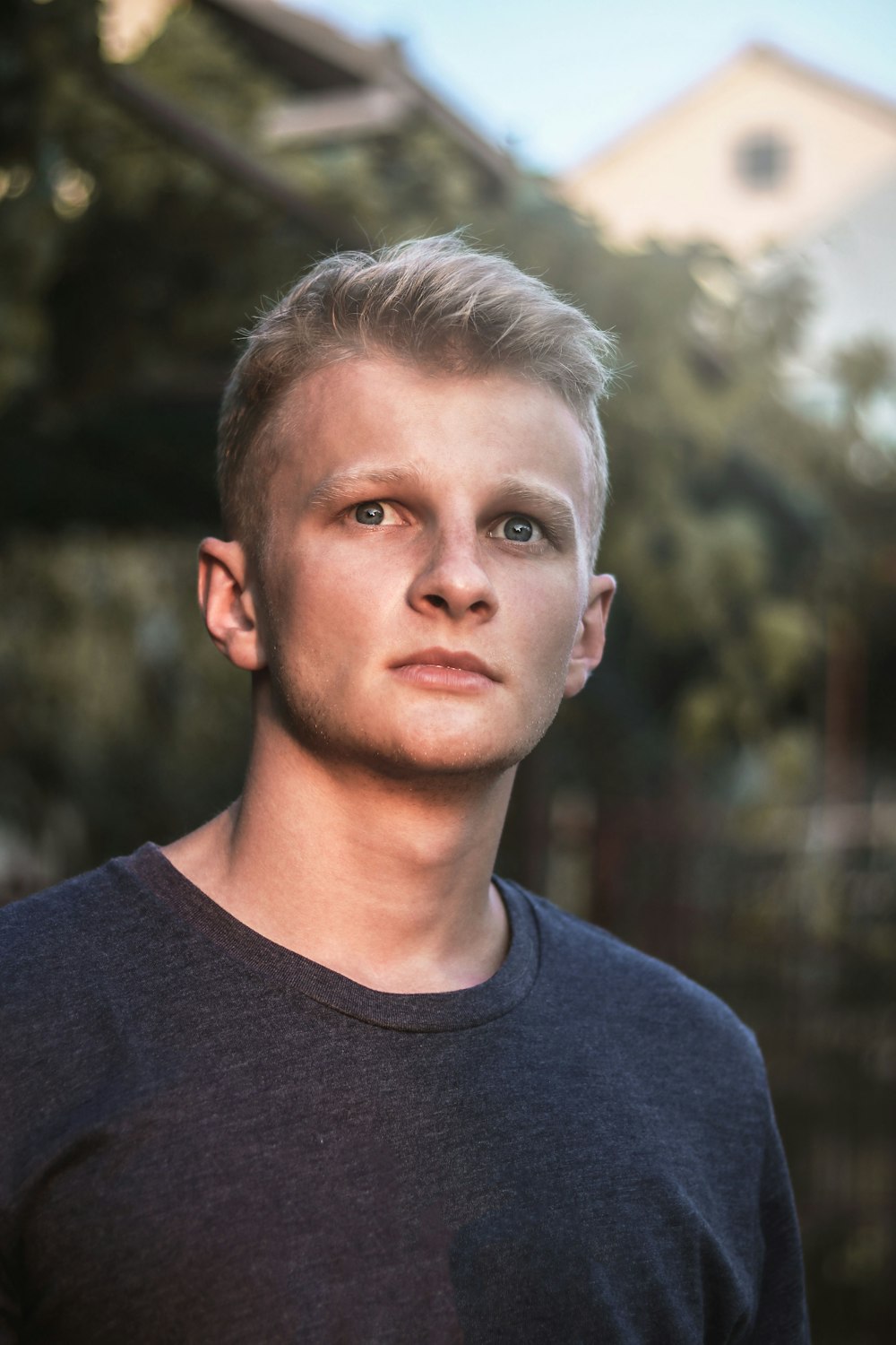 man with black crew-neck shirt