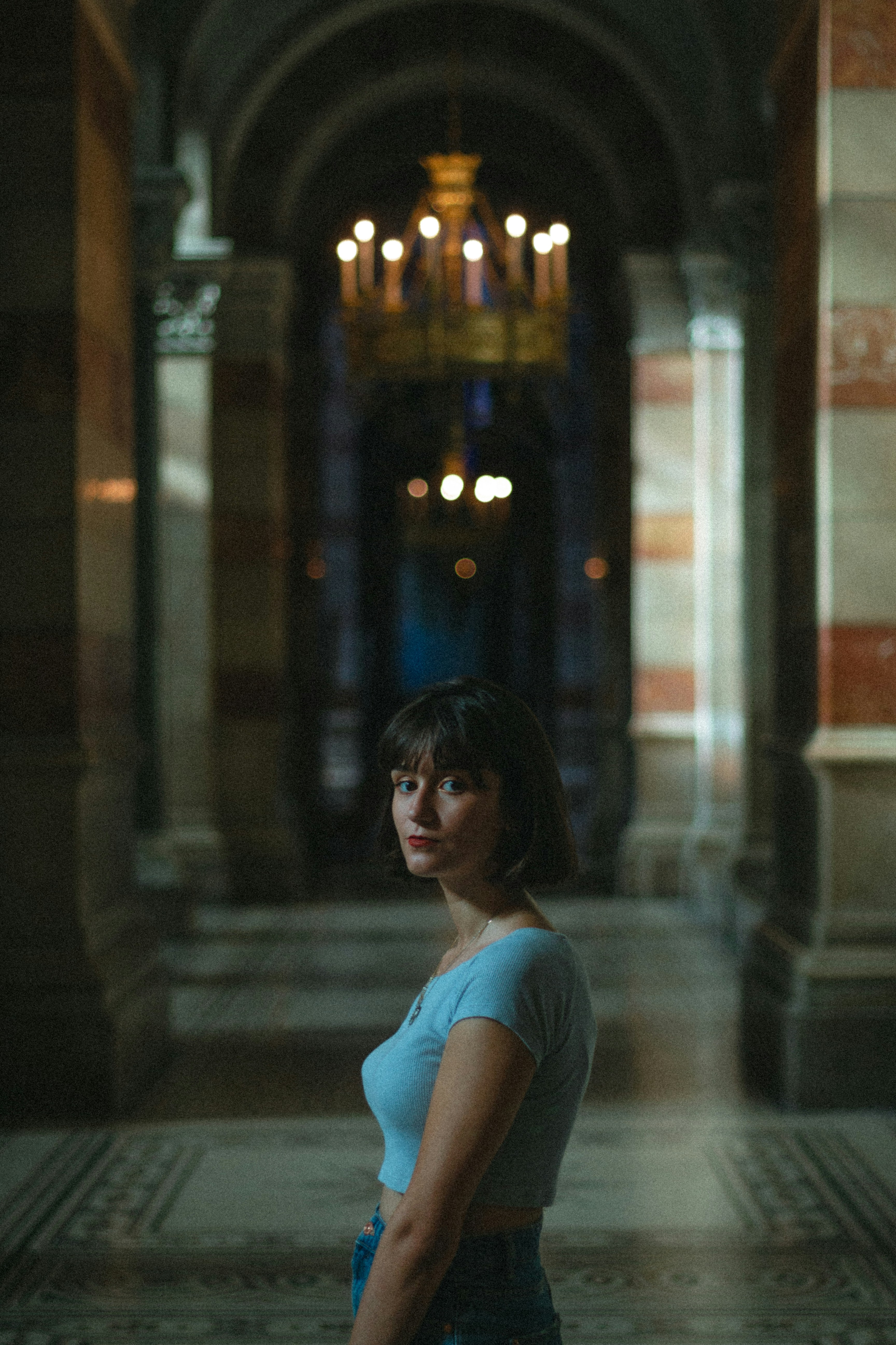 woman standing inside hall