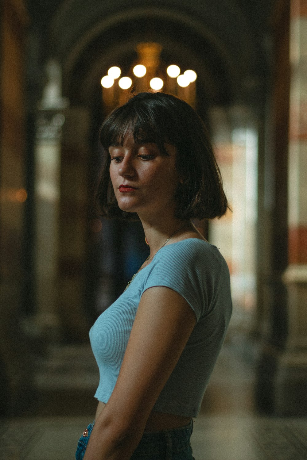 women wearing blue shirt close-up photography