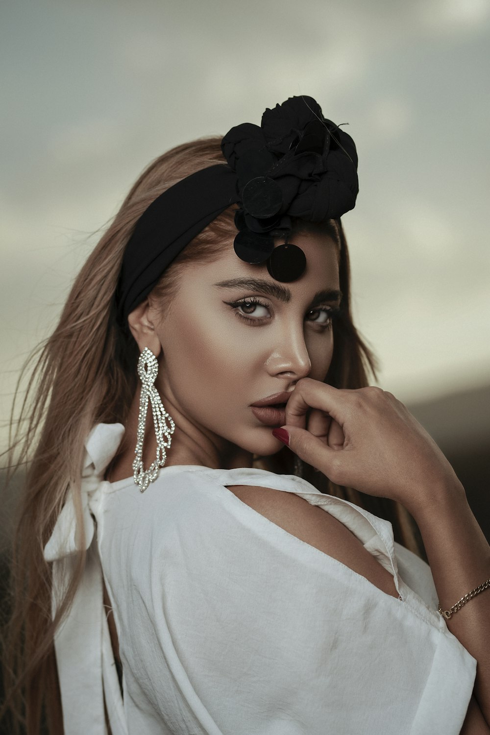 woman white short-sleeved shirt and black headband