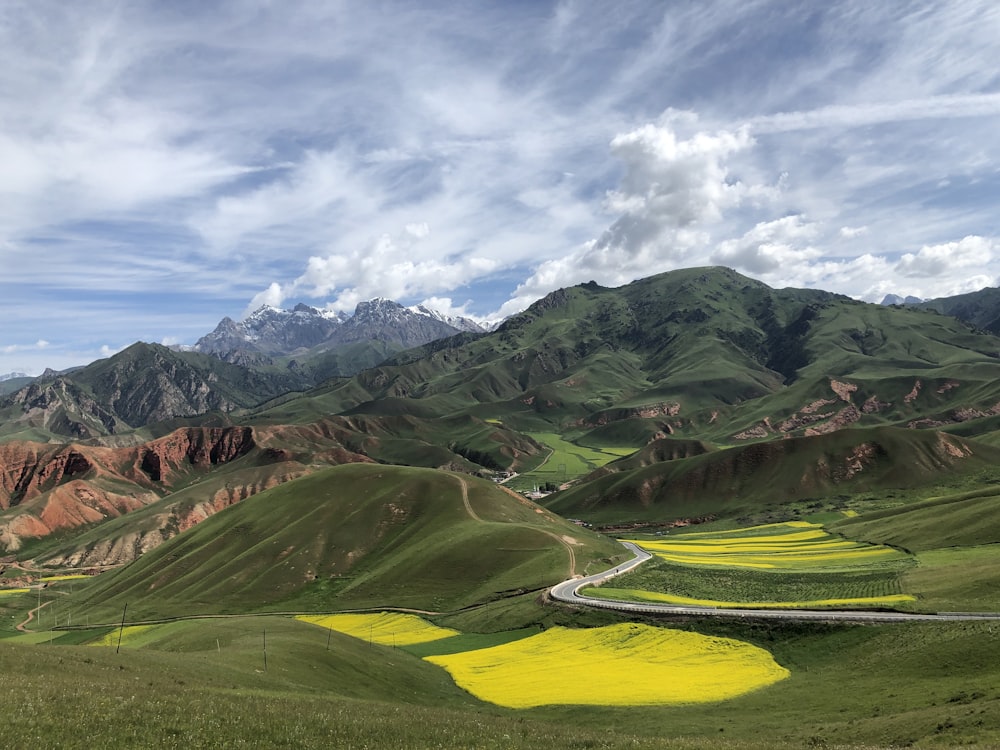 green and brown mountains at daytime