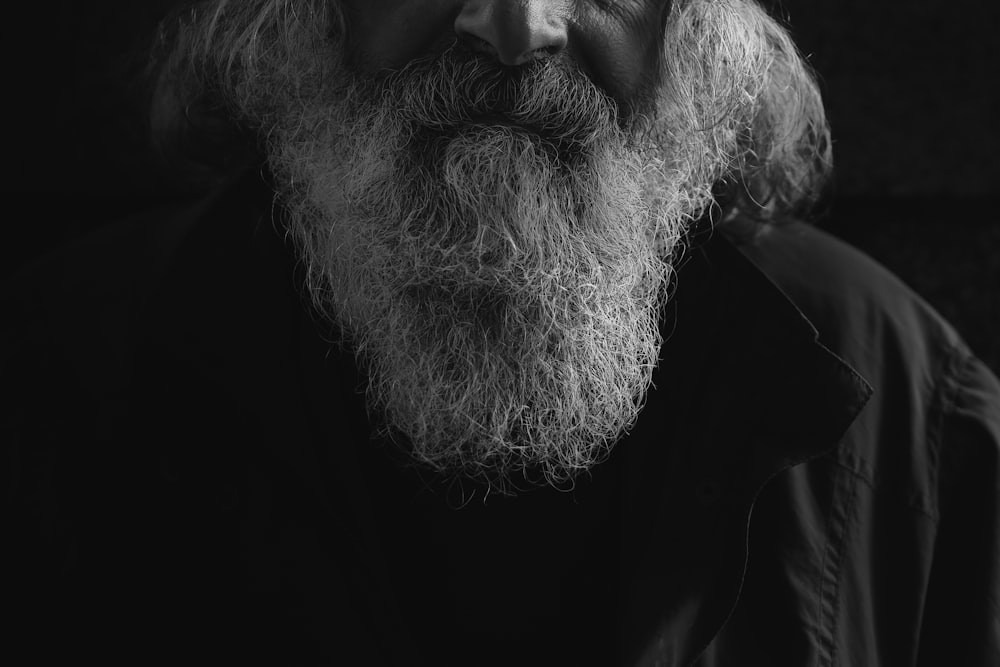man's beard grayscale photo