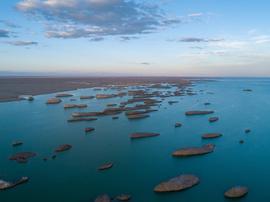 body of water under blue and white sky at daytime in Haixi China