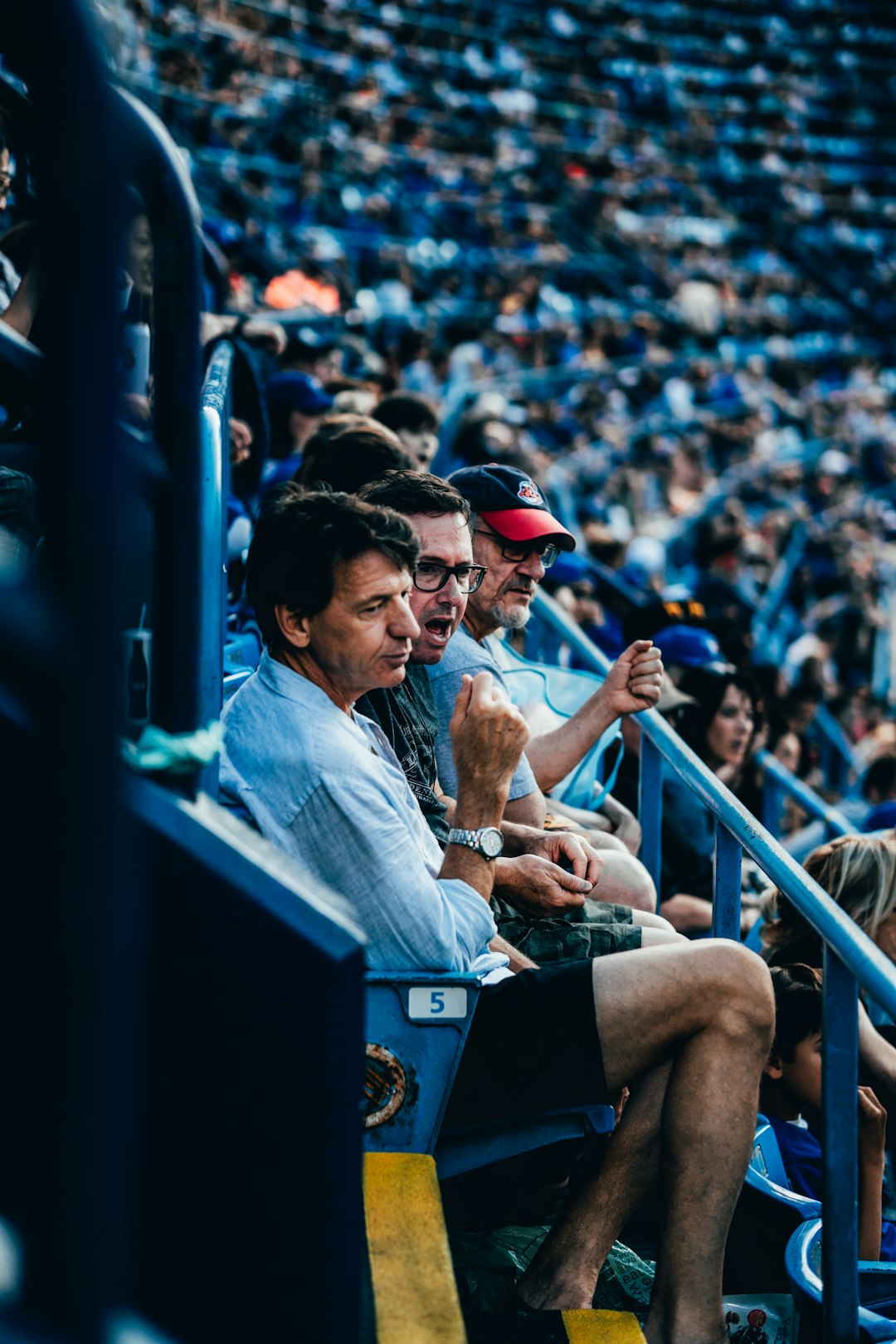 people sitting on bleachers