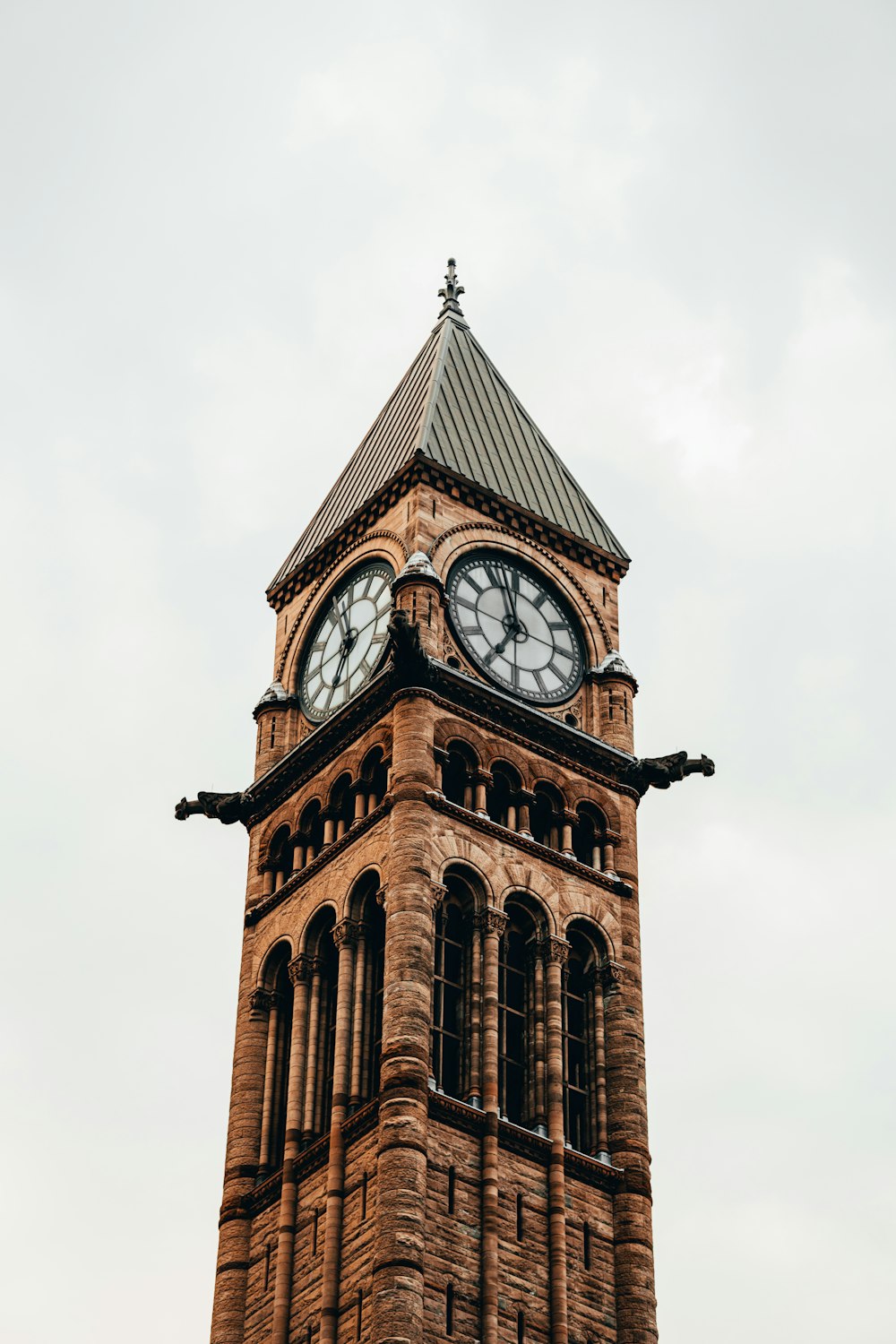 low angle photo of tower with clock