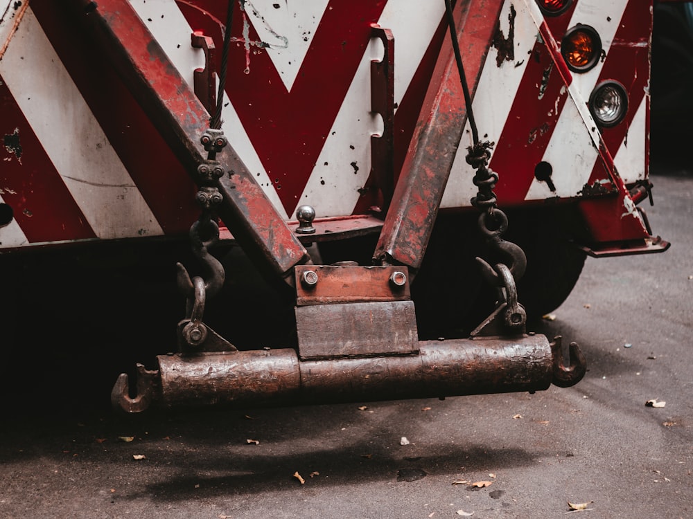 gray and red vehicle on gray surface