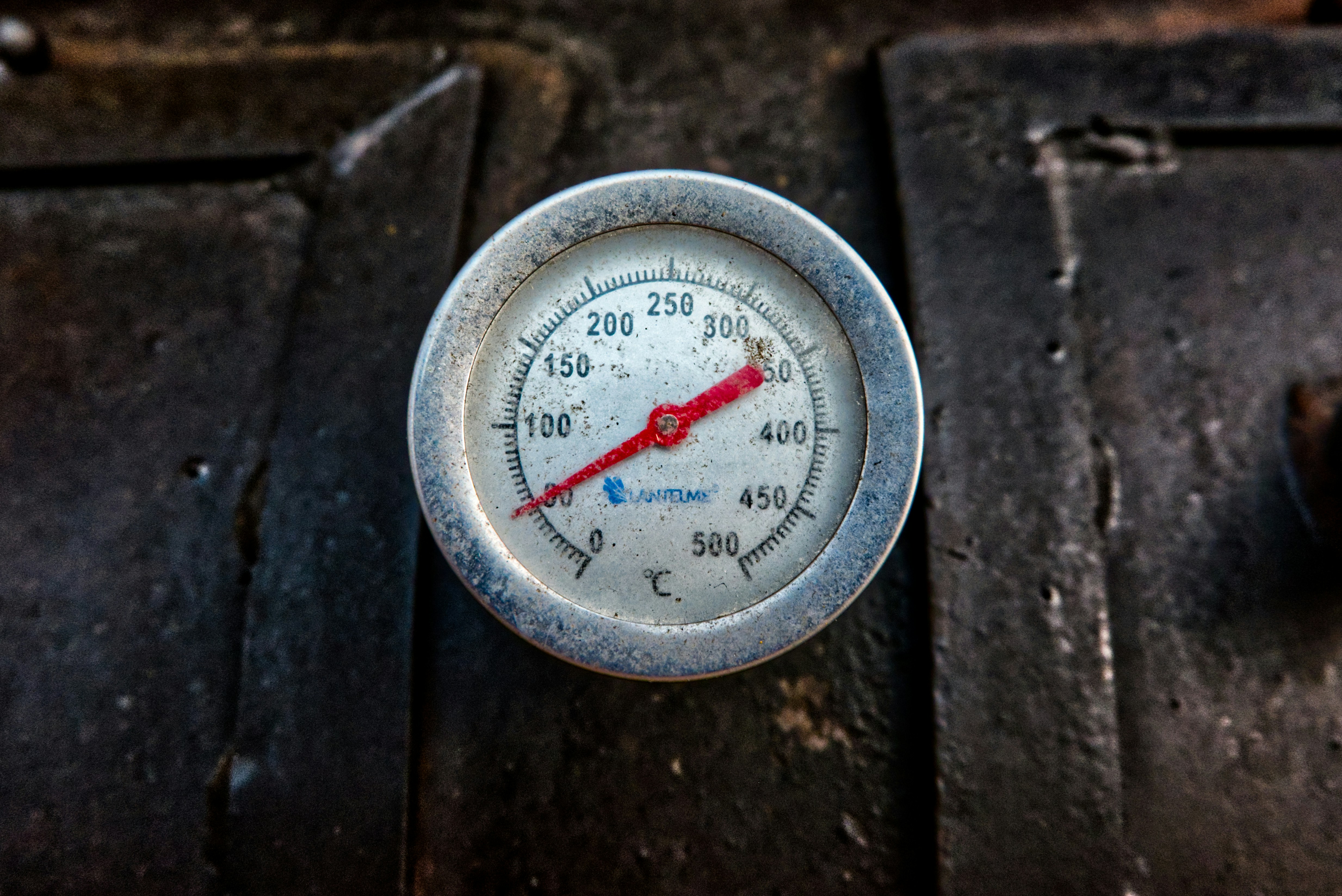 A stock photo of a temperature guage, showing 50 degrees Celcius.