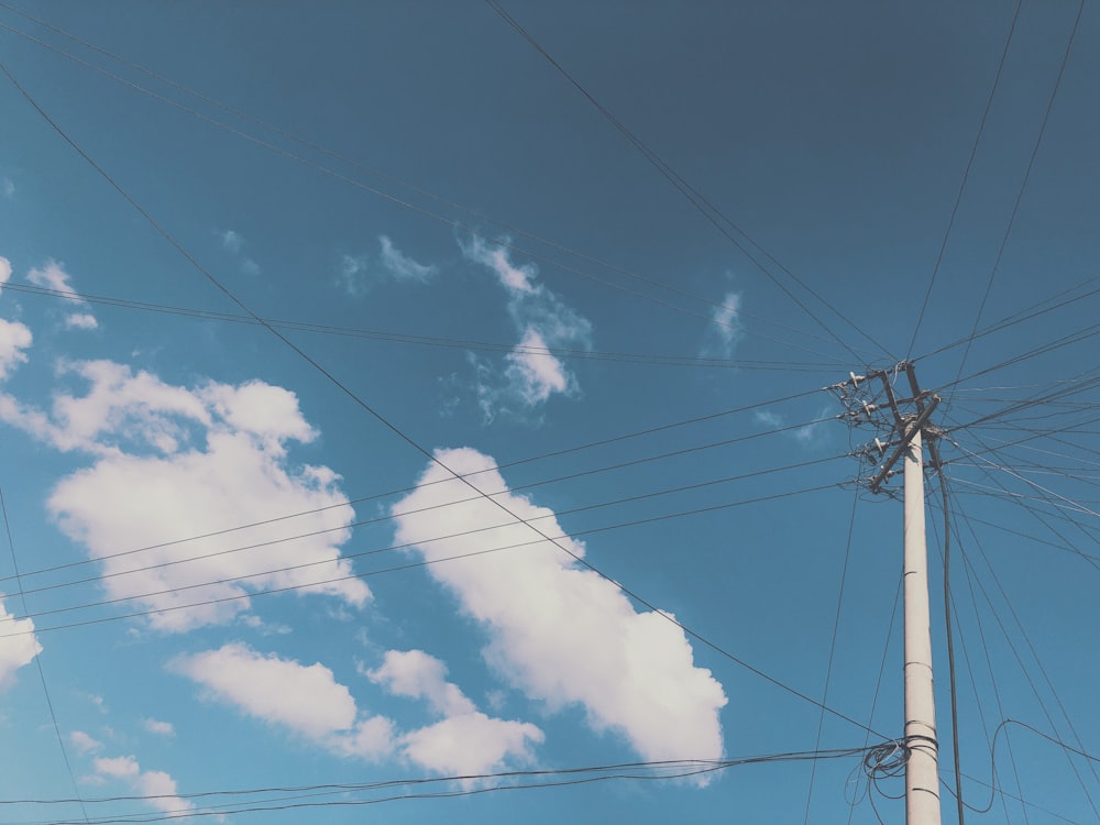 utility post under blue sky