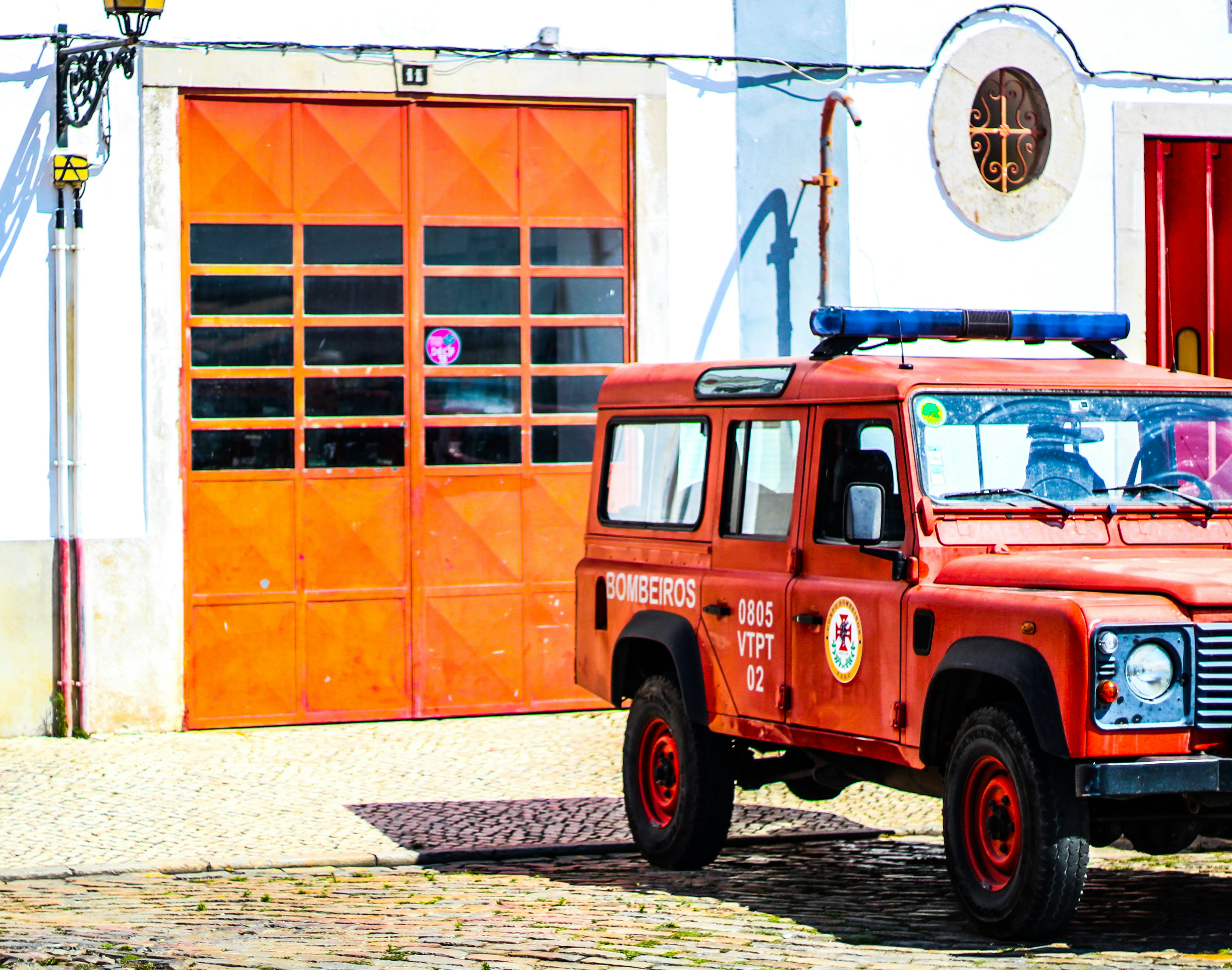 red truck parked outside building