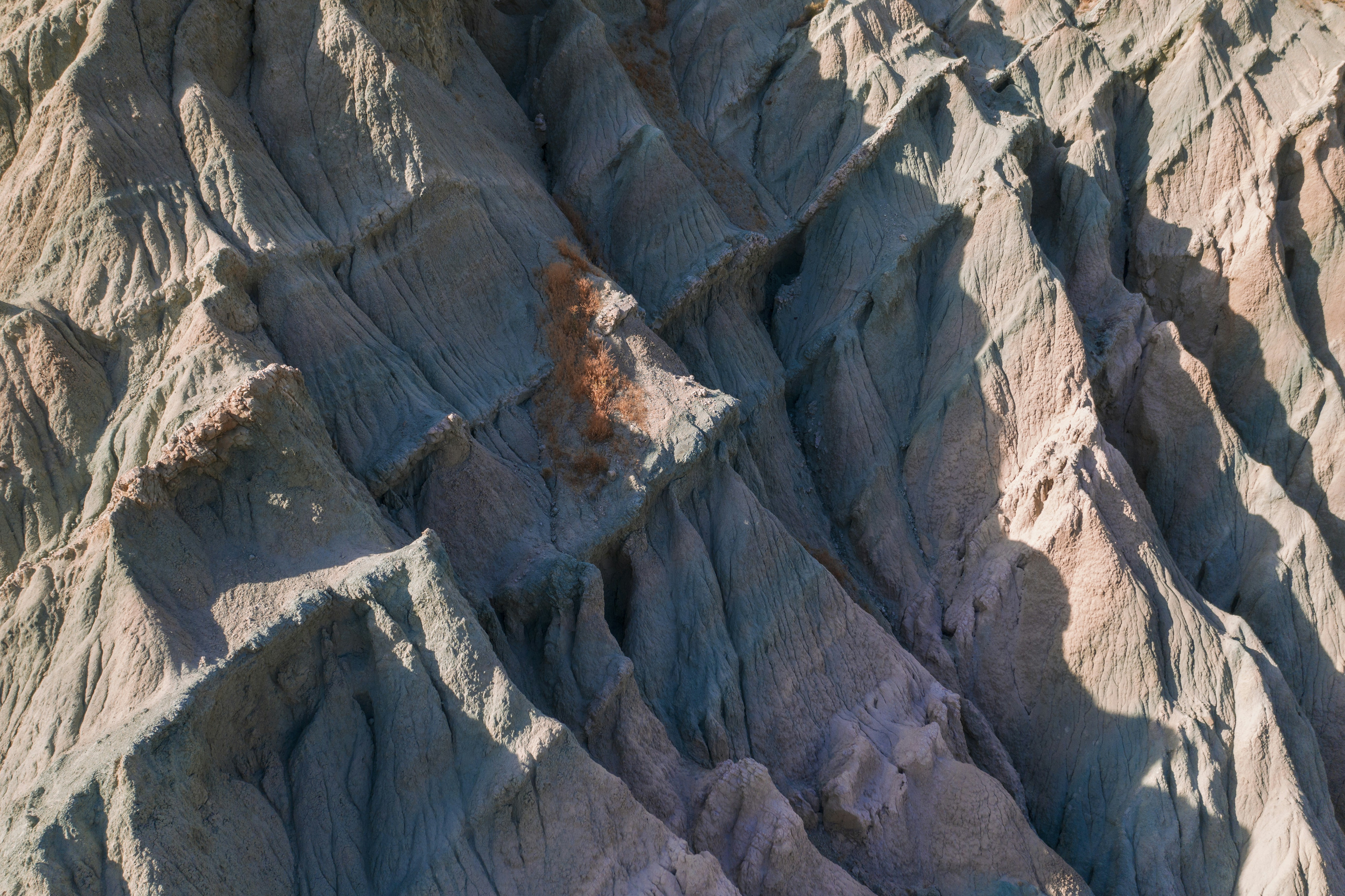 The last of my photos of amazing central Oregon textures. This is about 10 miles away from the Painted Hills and as far as I know is an unnamed area. These blue and pink banks were from the bottom of an ancient sea and are part of a tectonic uplift feature. No one does geology like Central Oregon.