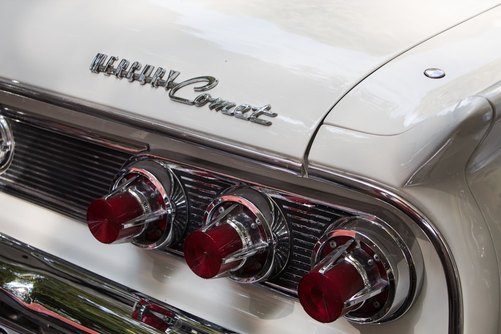 a close up of a classic car's emblem