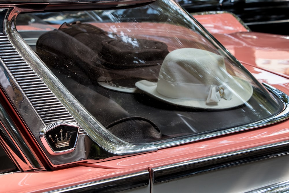 white hat on car