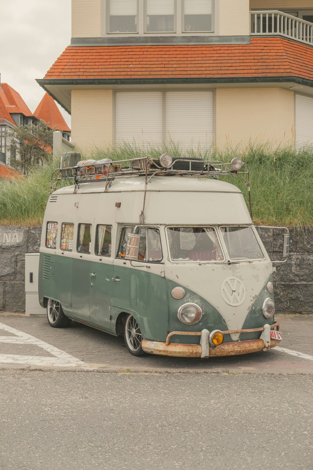 white and gray Volkswagen camper van