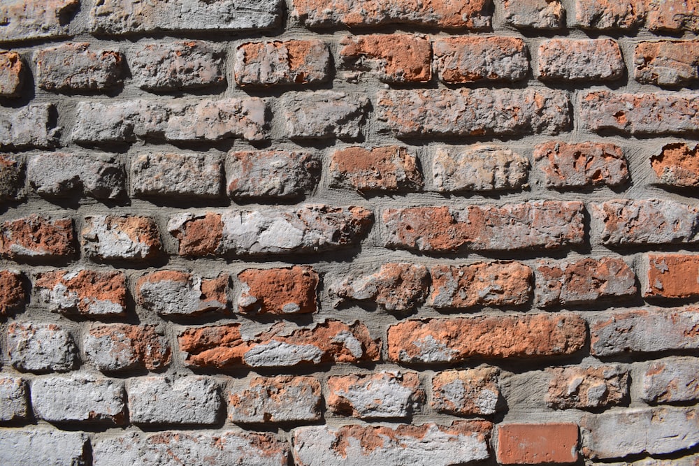 a close up of a brick wall made of bricks